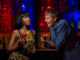 Couple at the bar having drinks