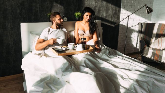 dreamstime_m_143785060 Beautiful couple in bed.