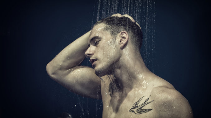 Close up Attractive Young Bare Muscular Young Man Taking Shower, with Eyes Closed