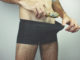 ..Man looking in his underwear