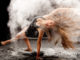 a female dancer in a cloud of white powder