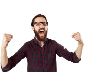 Handsome hipster cheering on white background