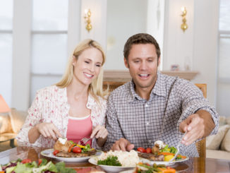 Couple Eating meal, mealtime Together Smiling