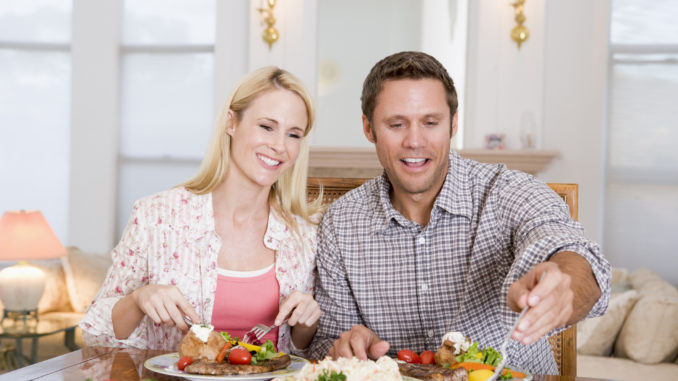 Couple Eating meal, mealtime Together Smiling