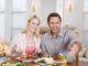 Couple Eating meal, mealtime Together Smiling