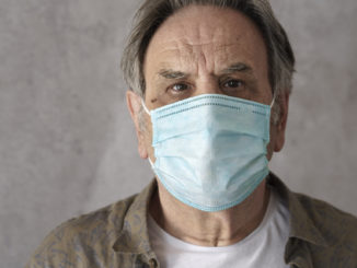 Old man wearing medical mask