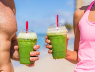 Man and woman with green shake