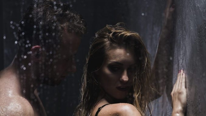 men having sex with a beautiful women under the shower