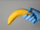 Doctor holding banana
