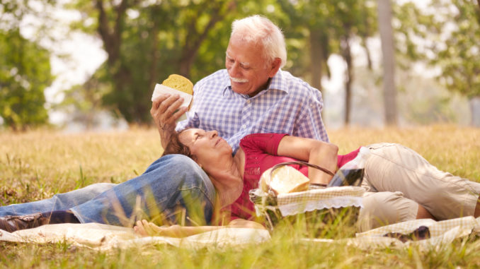 Old Couple Senior Man And Woman Doing Picnic