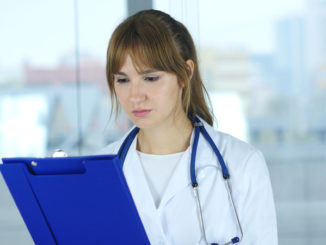 Close Up of Female Doctor Reading Medical Reports,4k , high quality