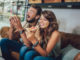 Shot of a young happy couple eating pizza in a restaurant