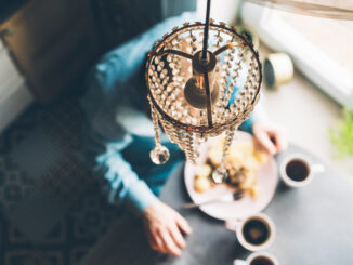 Breakfast at the oval table by the window.