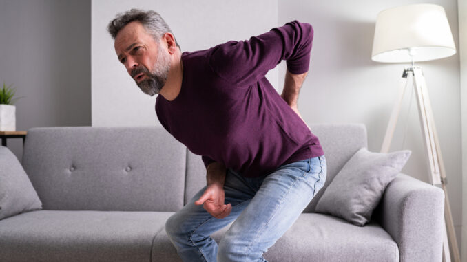 Older Senior Man With Back Pain Or Backpain