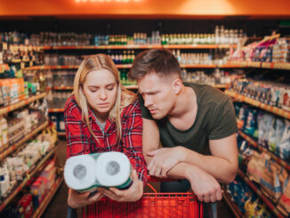 Young couple in grocery store.