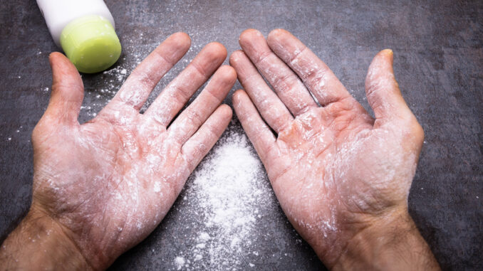 Powder On Man`s Hand