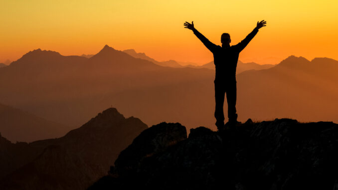 dreamstime_s_87086208 Happy celebrating winning success man at sunset