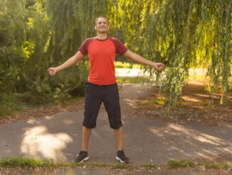 happy man in a park.