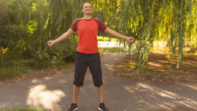 happy man in a park.