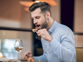 Man eating seafood at the restaurant